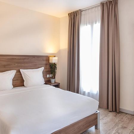 Hotel la Perle Montparnasse Paris Bagian luar foto