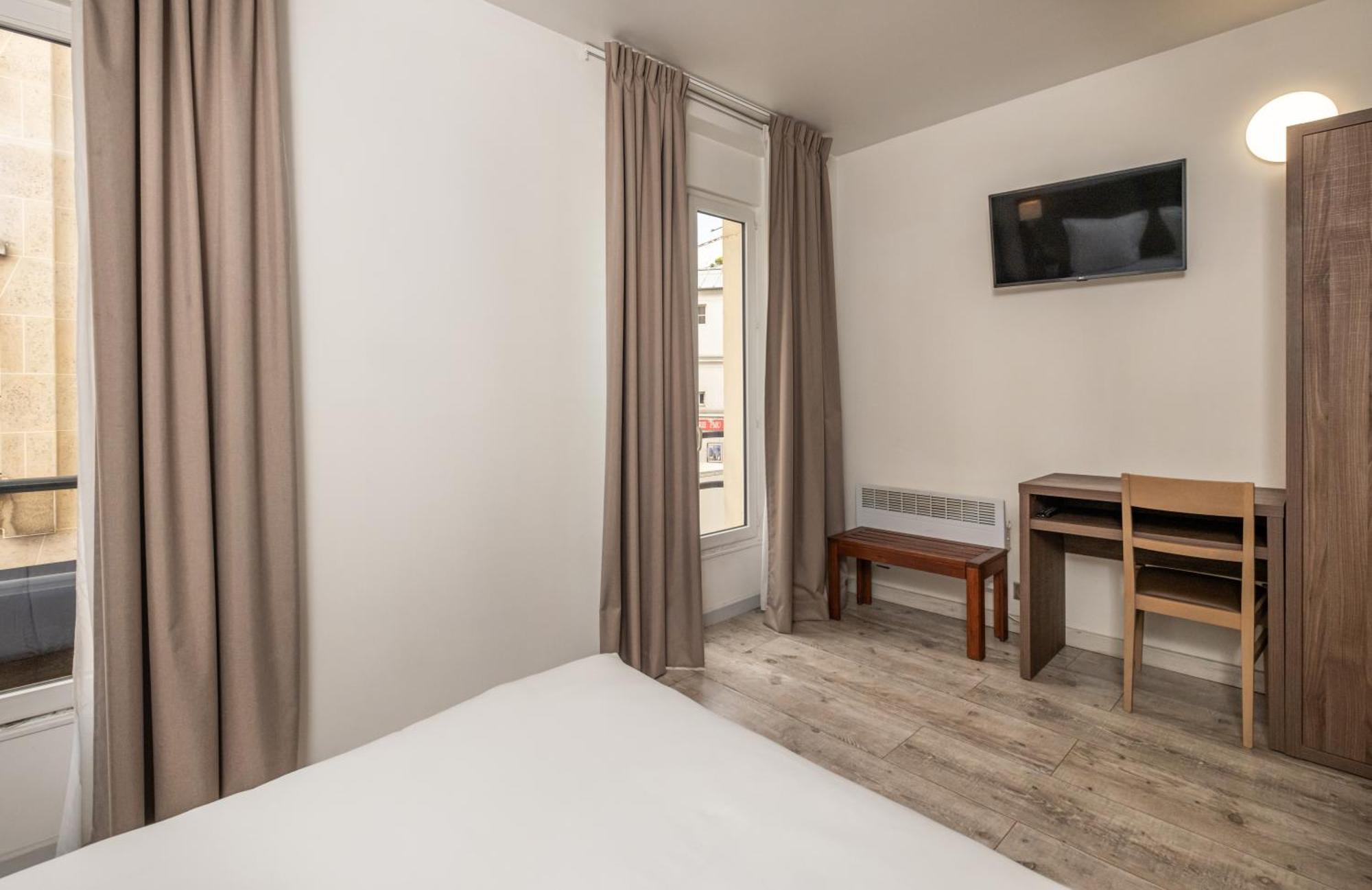 Hotel la Perle Montparnasse Paris Bagian luar foto