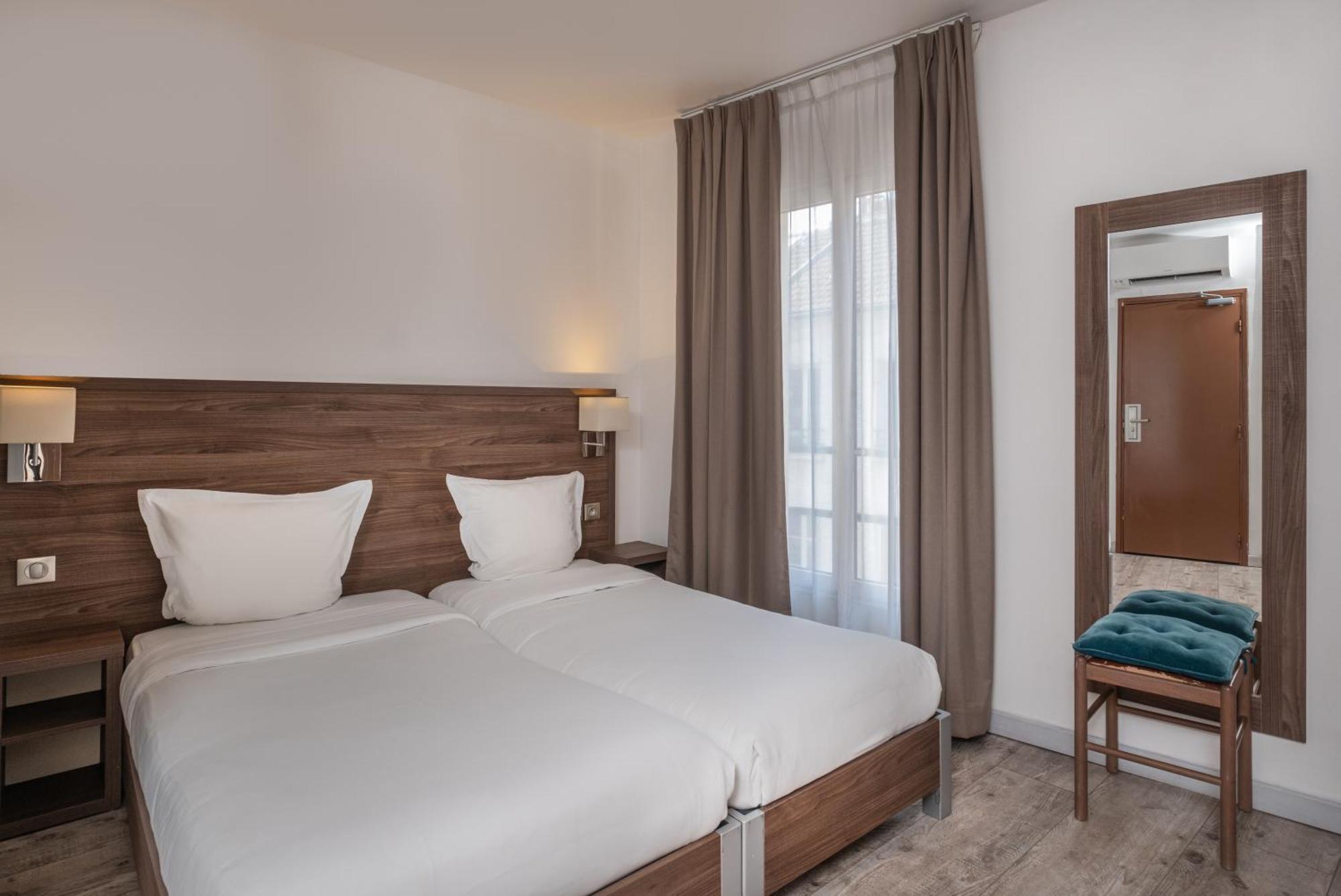 Hotel la Perle Montparnasse Paris Bagian luar foto