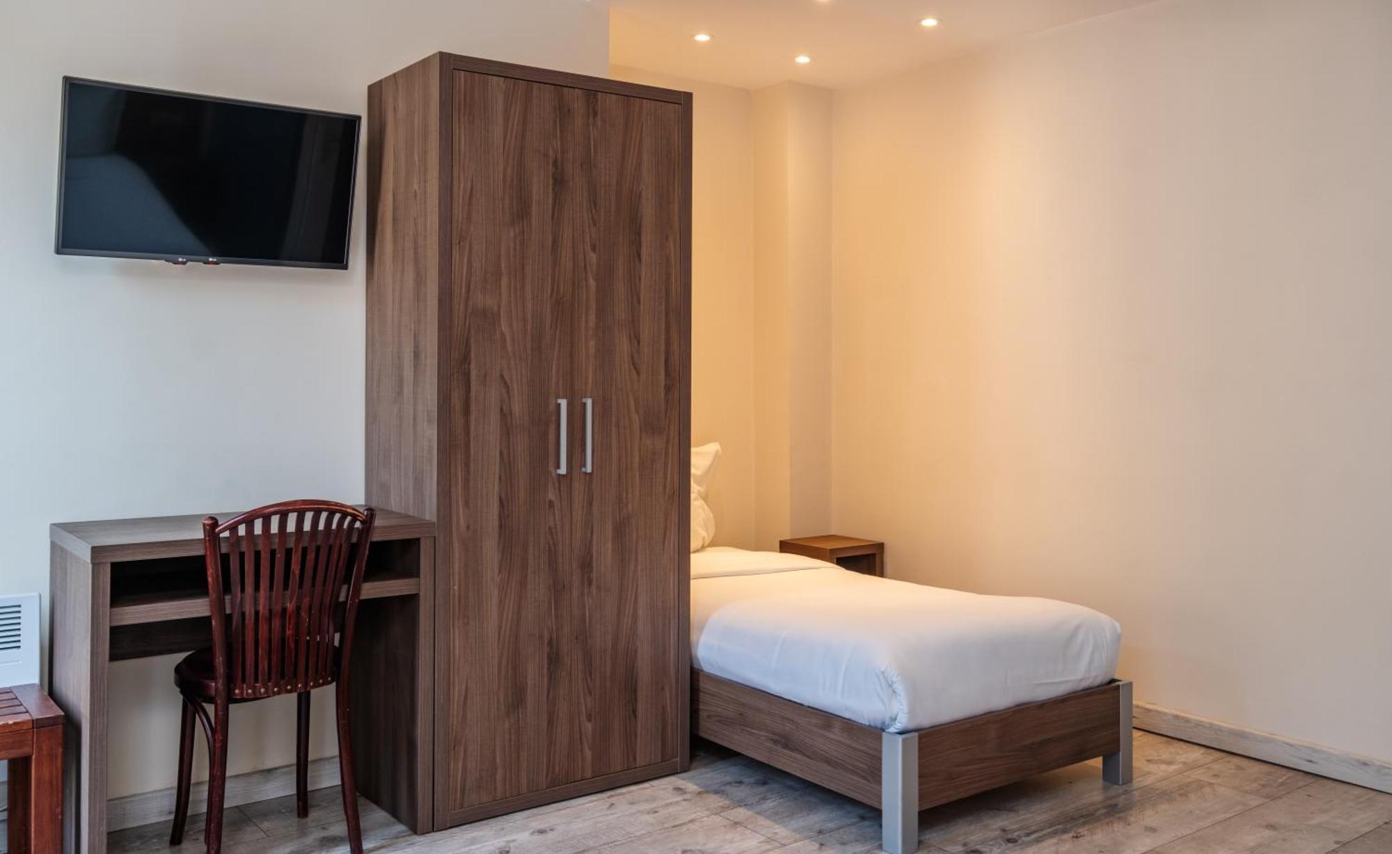 Hotel la Perle Montparnasse Paris Bagian luar foto